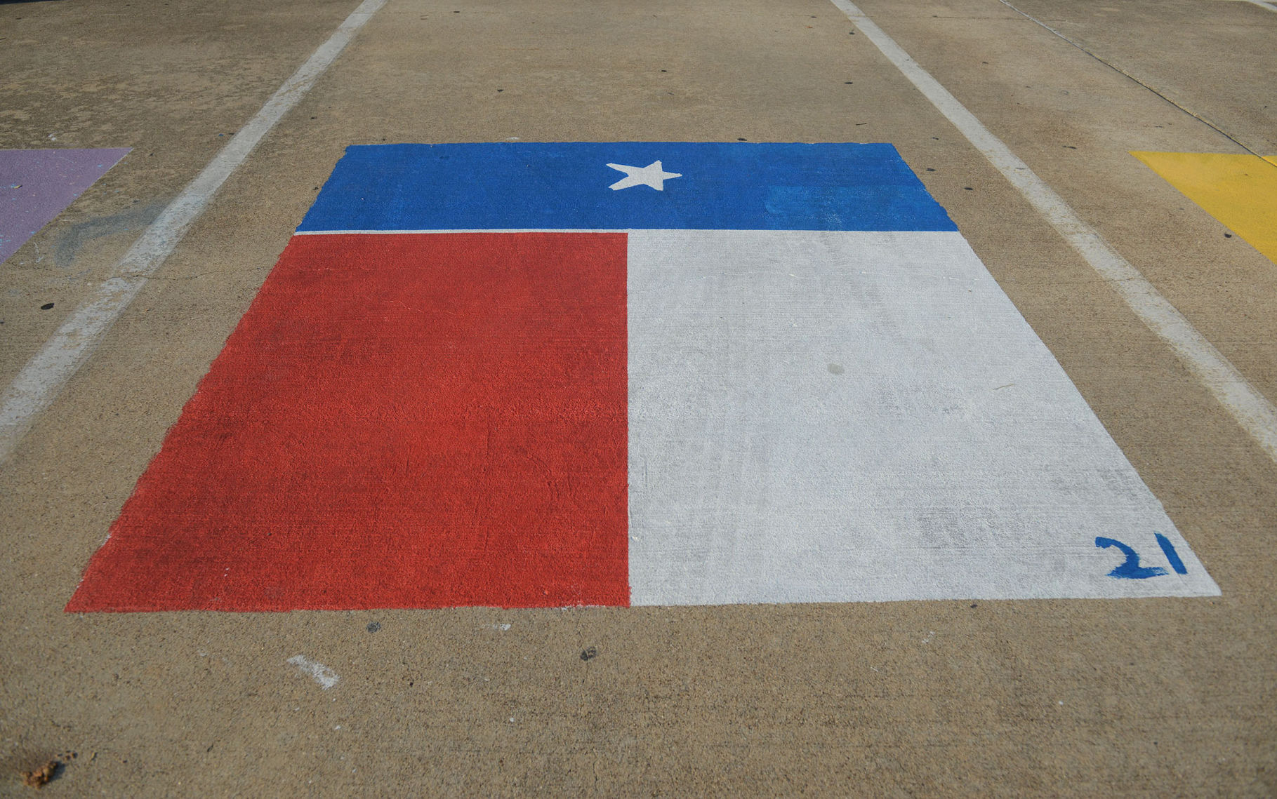 A&M Consolidated HS painted parking spots